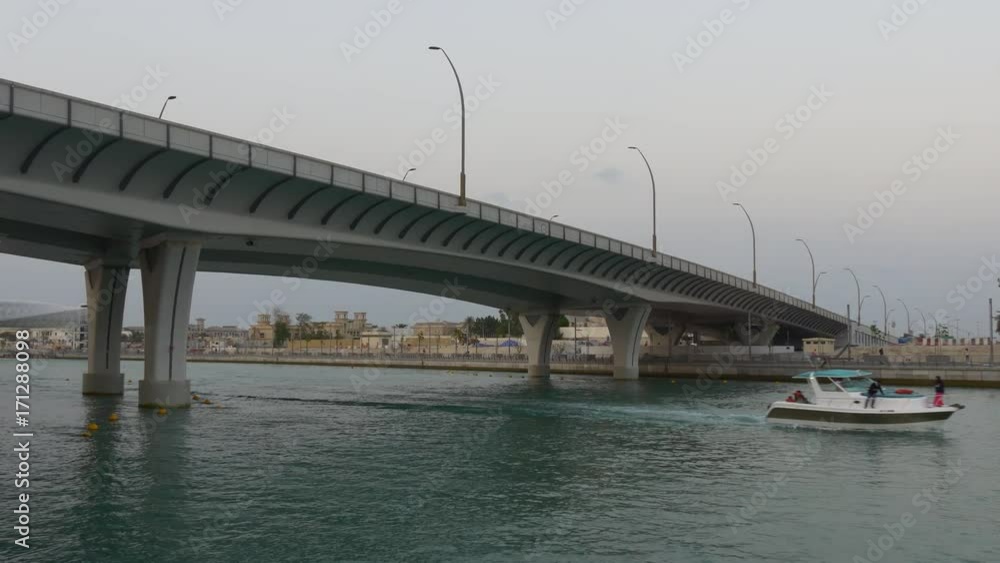twilight dubai city famous water canal traffic bridge motor boat ride panorama 4k uae
