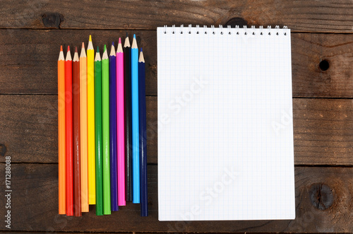 Notebooks and colored pencils