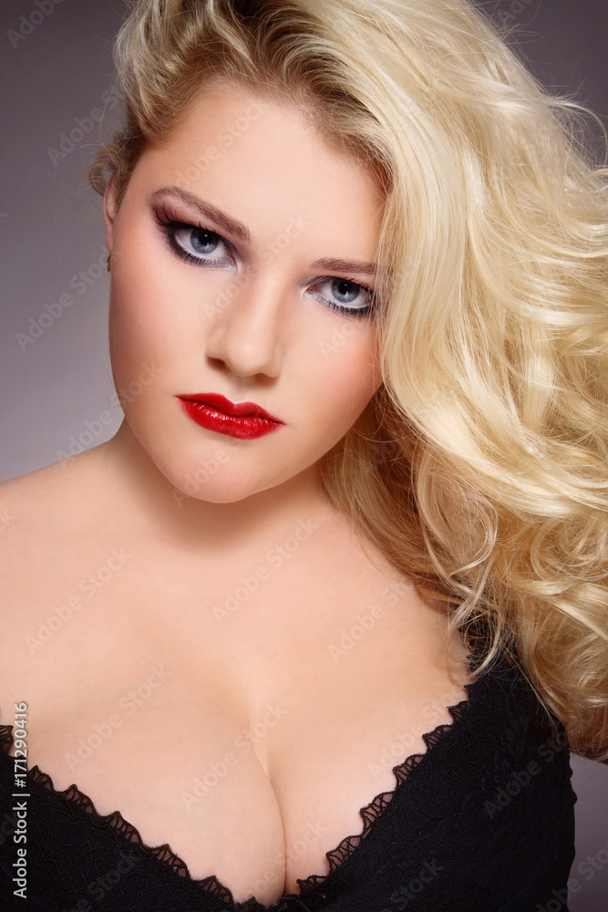 Young beautiful blonde plus-size woman in sexy lingerie Stock Photo | Adobe  Stock