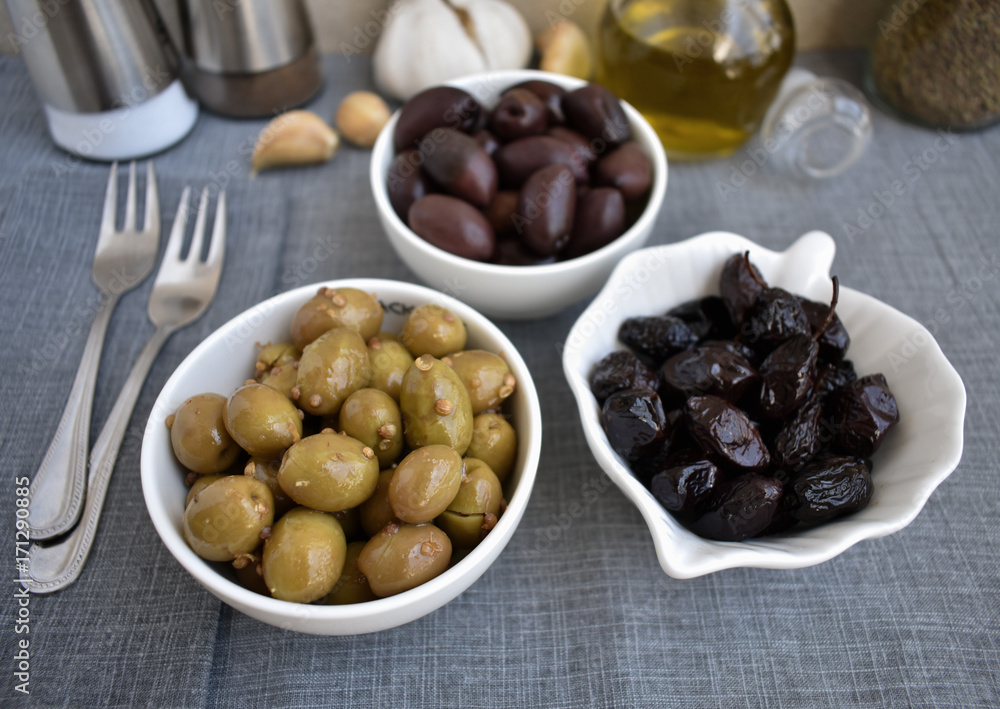 Pickled and dried olives as Mediterranean appetizer. Pickled and dried olives as Mediterranean appetizer.