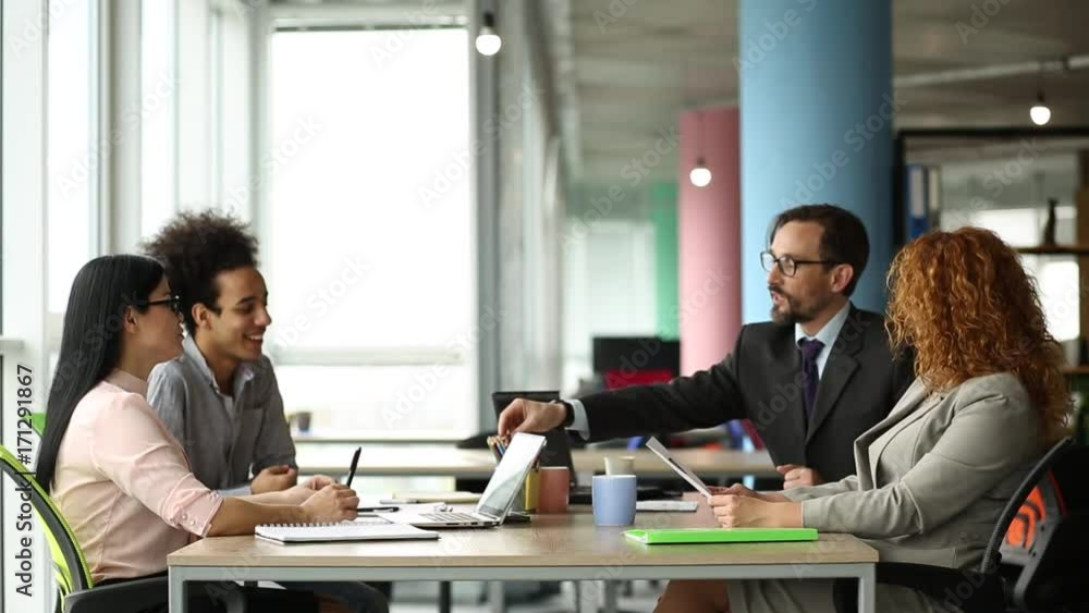 Two business teams negotiating in the office. Employees and clients working on agreement in working space. Two business teams negotiating in the office. Employees and clients working on agreement in working space.