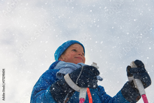 little boy ski in winter nature