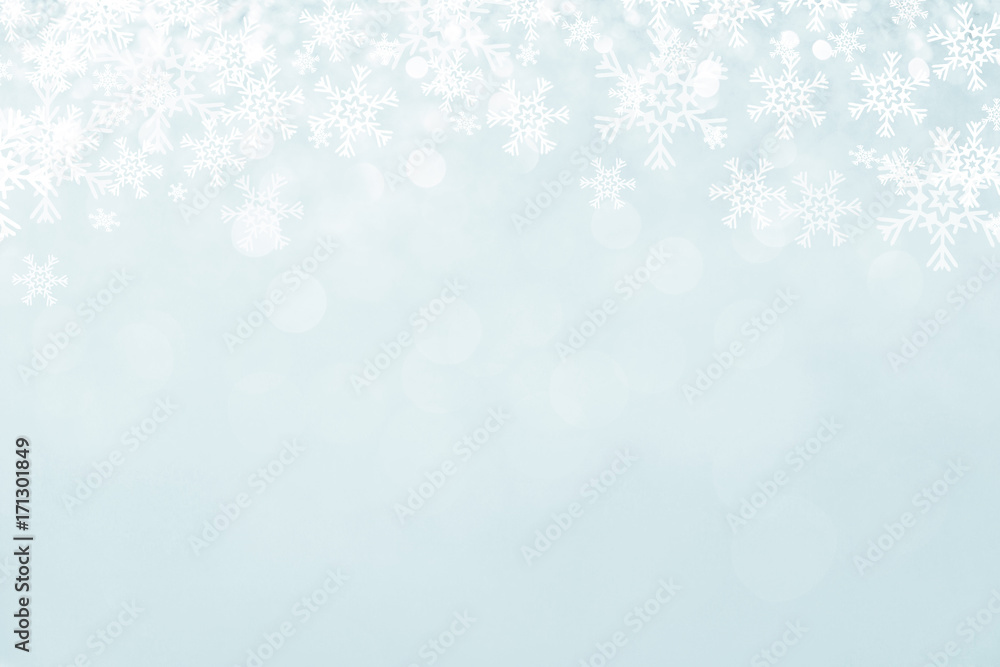 Blue Christmas background with snowflakes.