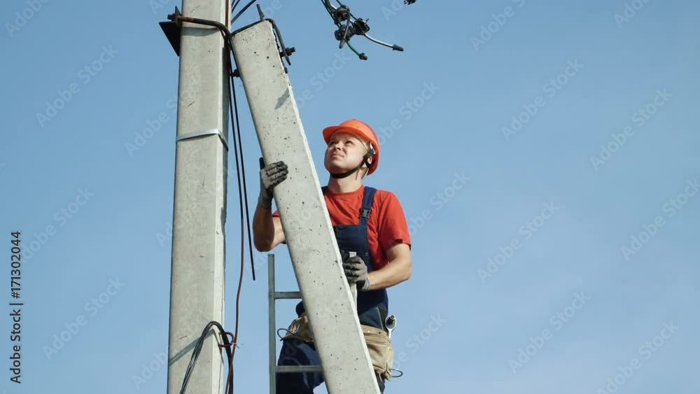 custom made wallpaper toronto digital an electrician climbing a newly installed utility pole with