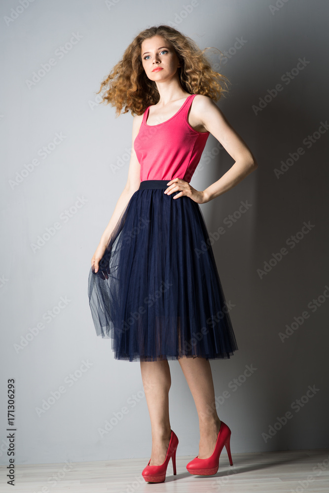 Young beautiful woman in pink shoes Young beautiful woman in pink shoes