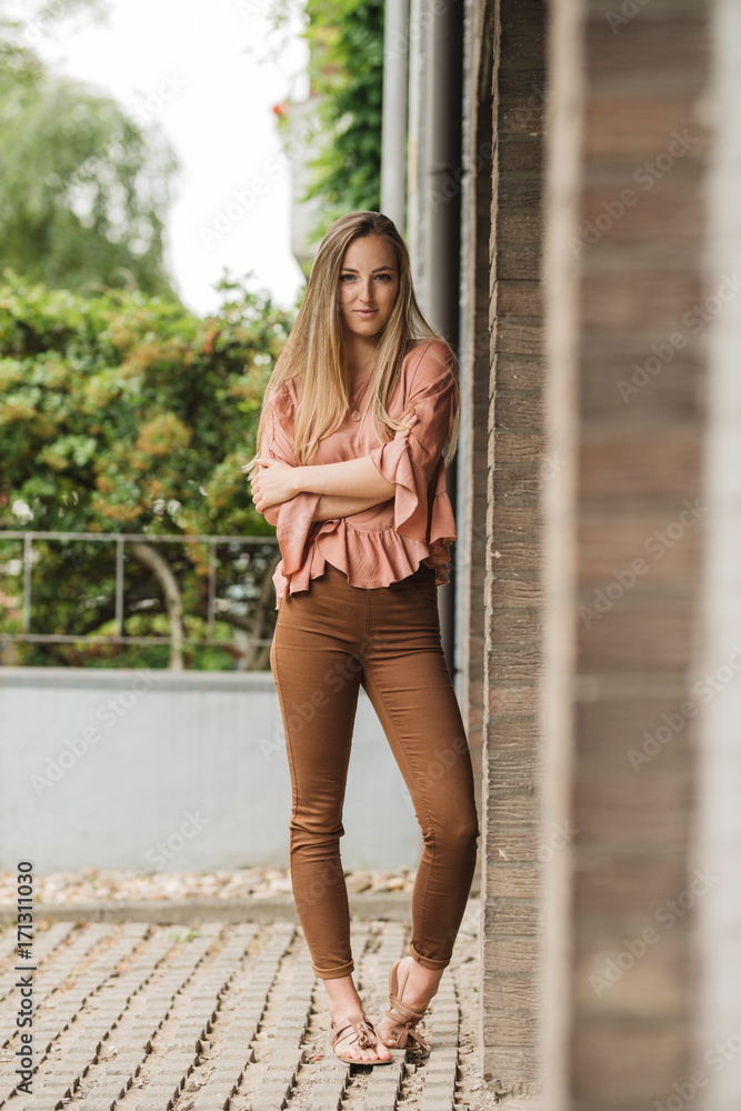 beautiful girl with long blond hair standing outdoor beautiful girl with long blond hair standing outdoor