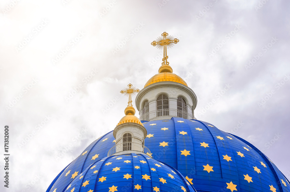 Domes of blue color with golden stars Trinity Cathedral in St. Petersburg