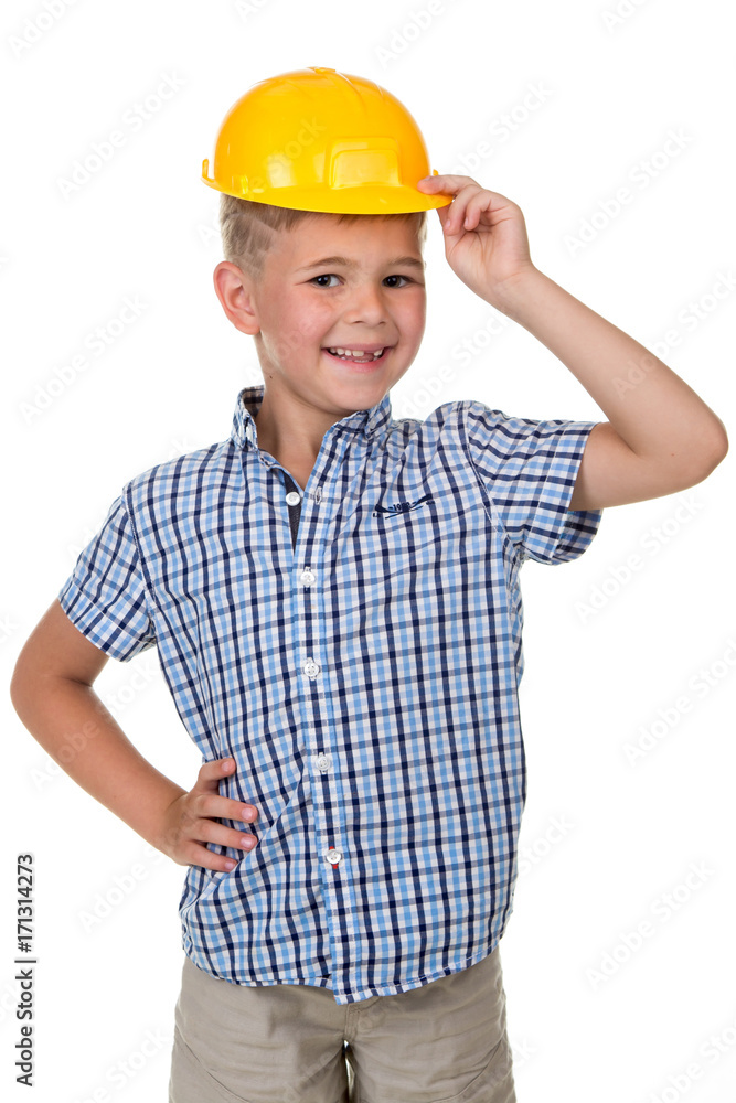 Emotional portrait of handsome smiling boy wearing building yellow hard hat. Funny cute guy - engineer. Emotional portrait of handsome smiling boy wearing building yellow hard hat. Funny cute guy - engineer.