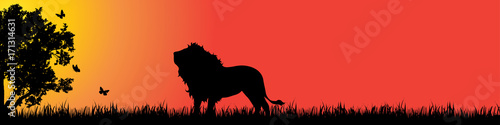Vector silhouette of lion in nature at sunset. © majivecka
