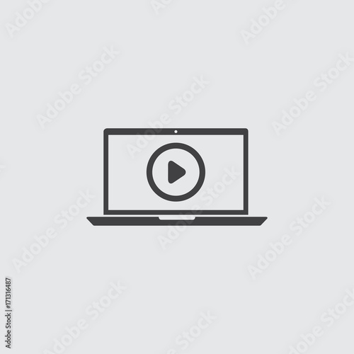 Laptop with play button icon in a flat design in black color. Vector illustration eps10