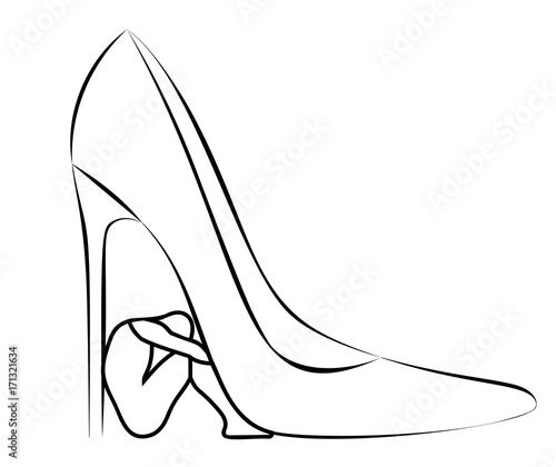 a man under a heel of woman shoes - concept of henpecked photo