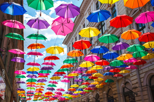 Street decorated with colored umbrellas