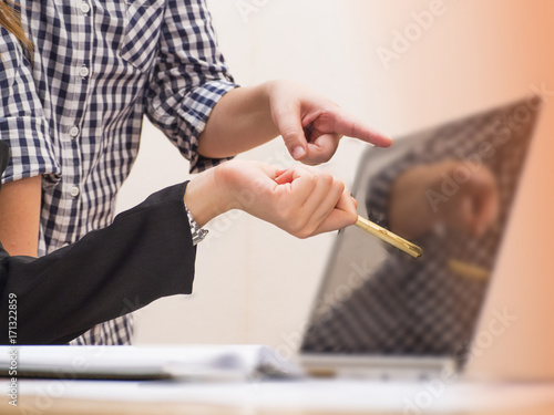 Business colleagues working together,at office hour,office work,busy hur work time of  the business worker,business teamwork,join work together,blurry light background. photo