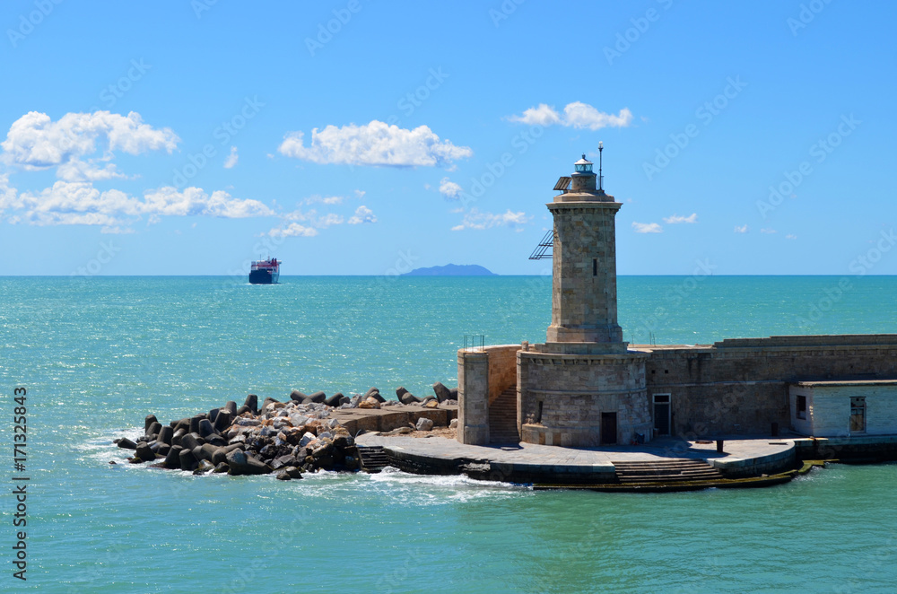 Faro di livorno.  Lighthouse in Livorno. Boat in arrive.
