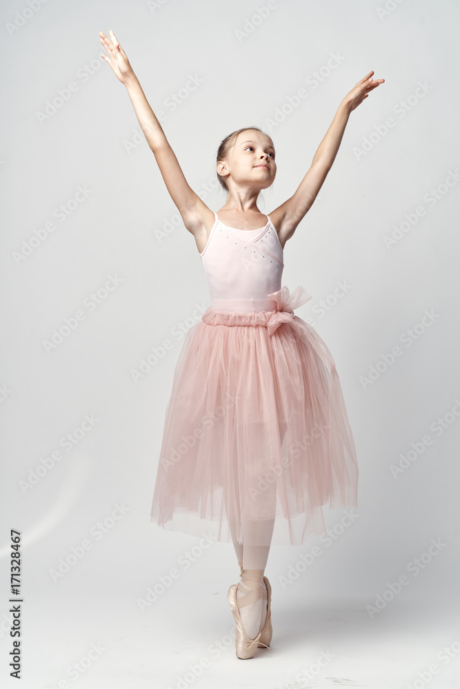 Naklejka premium the little ballerina is pulling her hands