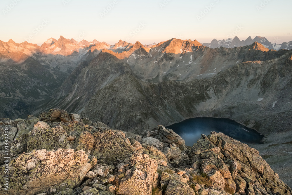mountain range with lakes and sunshine