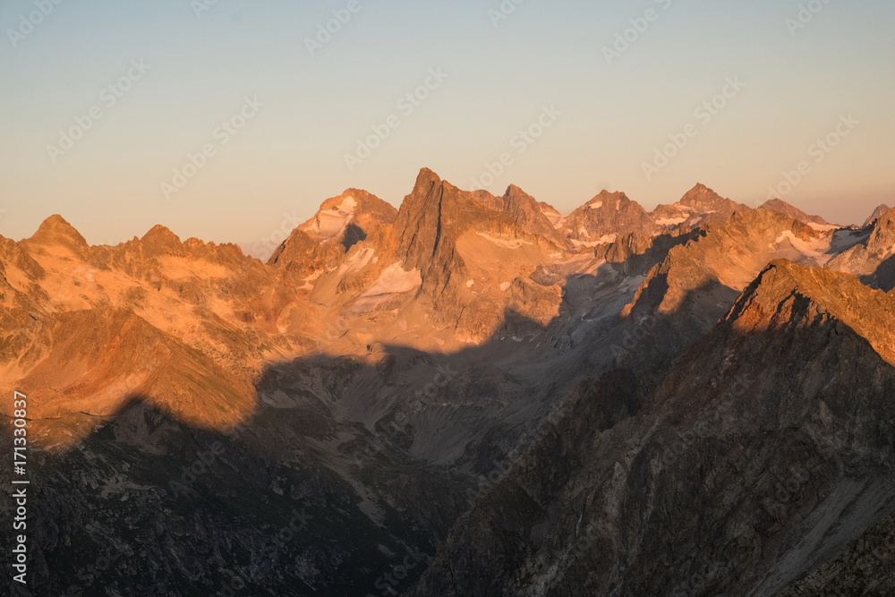 mountain ranges with snow in the sunlight at dusk or dawn in the Caucasus