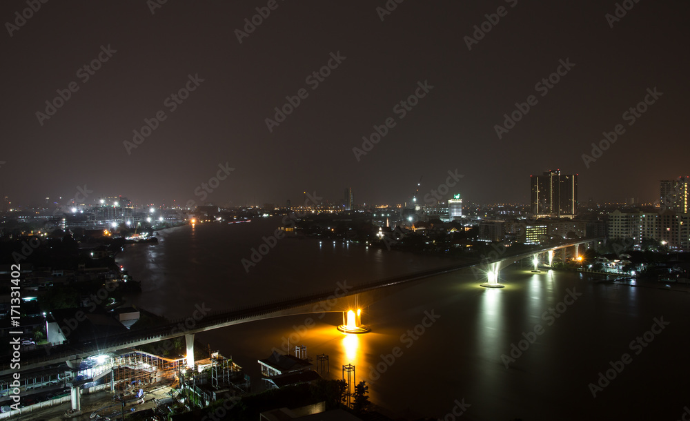 Landscape view of Bangkok with Chao Phraya river at night, Bangkok Thailand