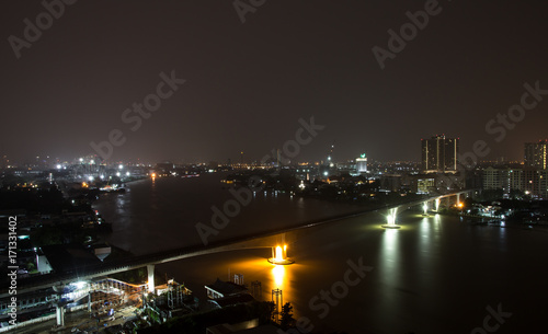Landscape view of Bangkok with Chao Phraya river at night  Bangkok Thailand