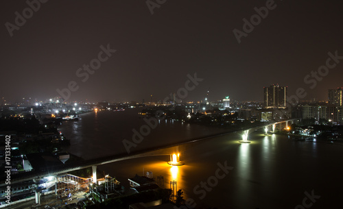 Landscape view of Bangkok with Chao Phraya river at night, Bangkok Thailand