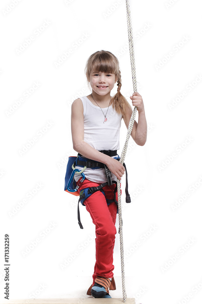 Girl climber on a white background looks at the camera Girl climber on a white background looks at the camera