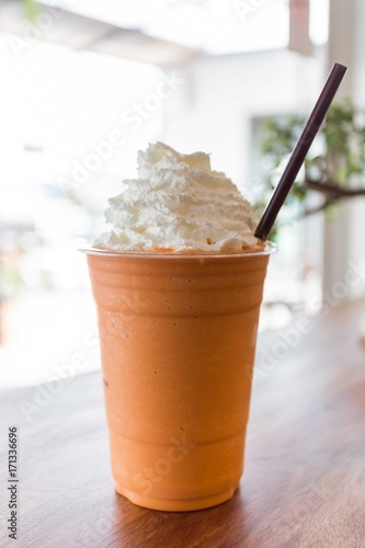 Thai tea frappe smoothie with wipping cream, sweet drink.