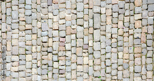 Fotografie, Obraz Cobblestone. Ancient stone floor texture
