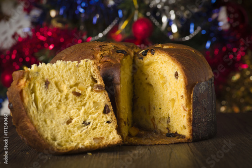 Panettone, sweet typical Italian Christmas on holiday background