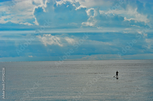 Solitude - Paddle Boarder & Storm