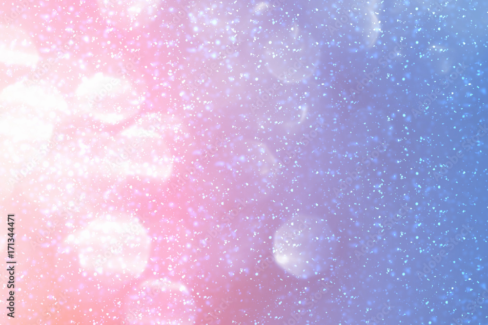 Magic Festive blue background. Abstract bokeh light and red sunlight. Christmas glitter Magic Festive blue background. Abstract bokeh light and red sunlight. Christmas glitter