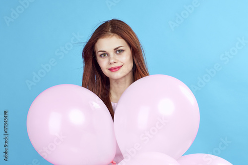 woman, pink balloons, portrait, blue background