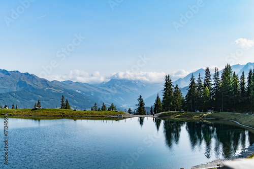 mountains with forest and lake