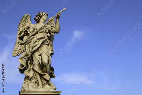 Medieval figure of an angel on the famous bridge Saint Angelo bridge, Rome, Italy
