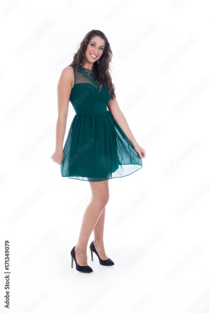 beautiful smiling young girl with long black hair in green dress,on white background beautiful smiling young girl with long black hair in green dress,on white background
