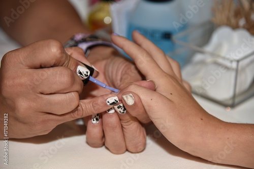 Manicure painting fingernails beauty salon