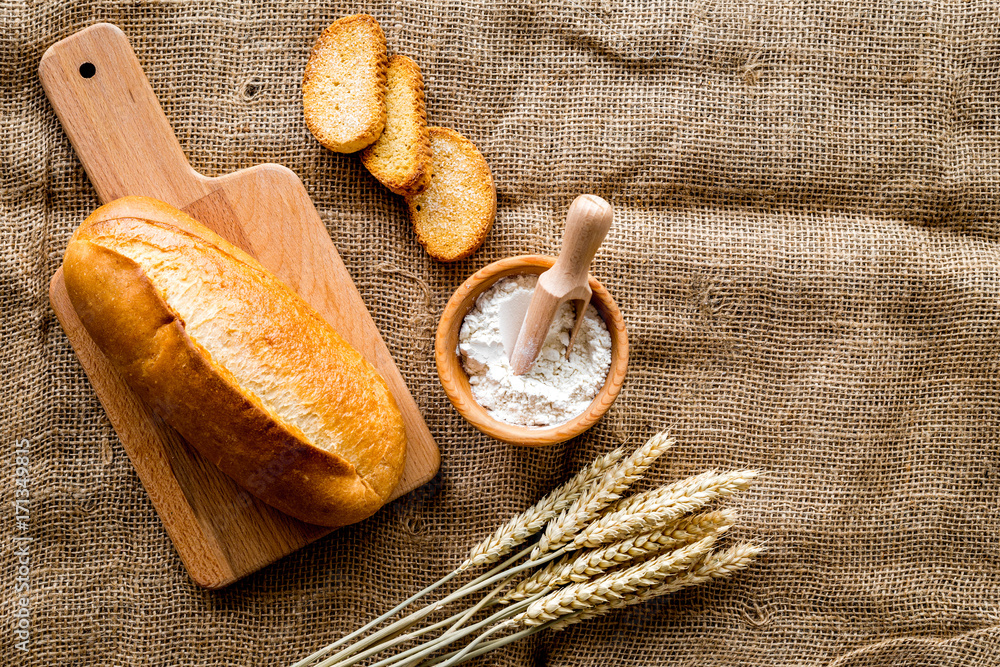 baking fresh wheaten bread on bakery work table background top view baking fresh wheaten bread on bakery work table background top view