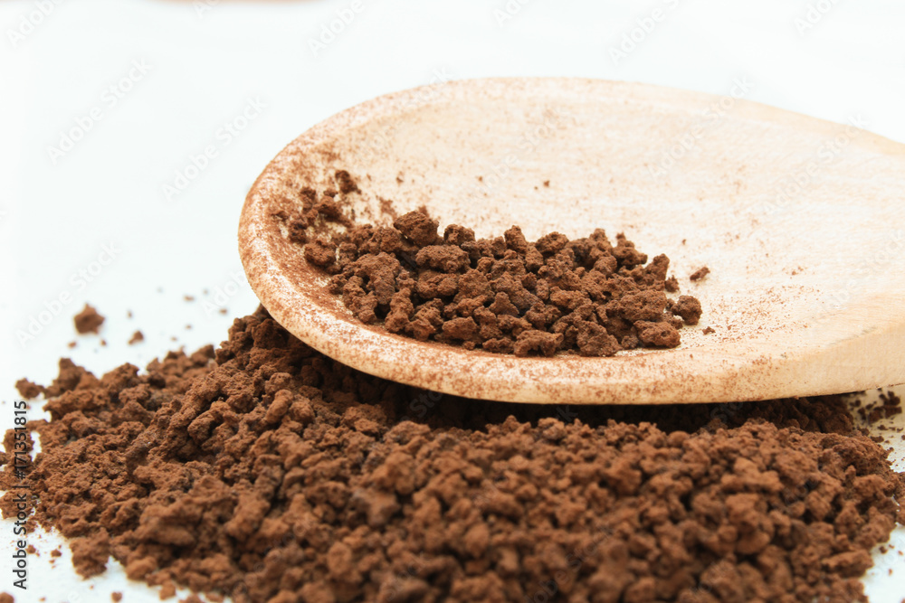instant coffee in wooden spoon instant coffee in wooden spoon