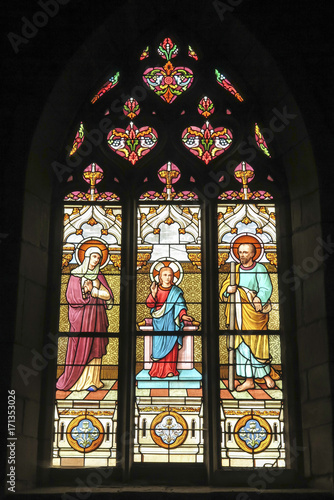 Iffendic, France - September 9, 2016: Stained glass window in the Church of Saint Eloi in Iffendic, France.