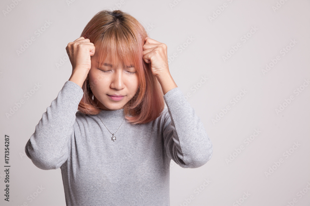 Young Asian woman got sick and headache. Young Asian woman got sick and headache.