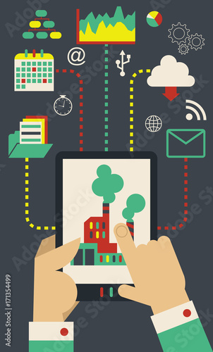 Hands holding a Tablet and controlling a Factory from it