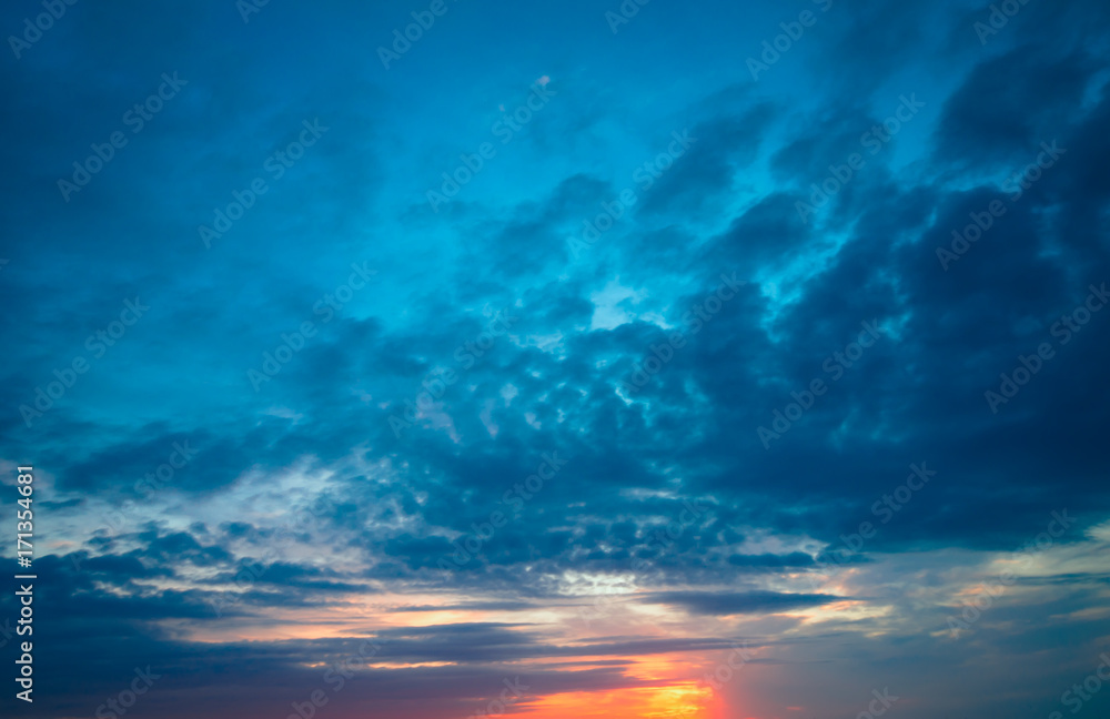 Fototapeta premium Last rays of the sun at sunset and beautiful clouds.