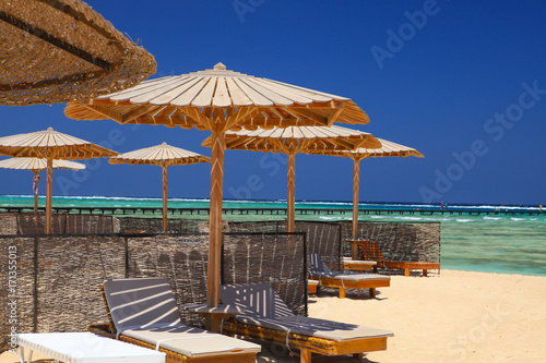Egyptian parasol on the beach of Red Sea. Marsa Alam  Egypt.