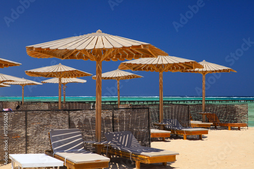 Egyptian parasol on the beach of Red Sea. Marsa Alam  Egypt.