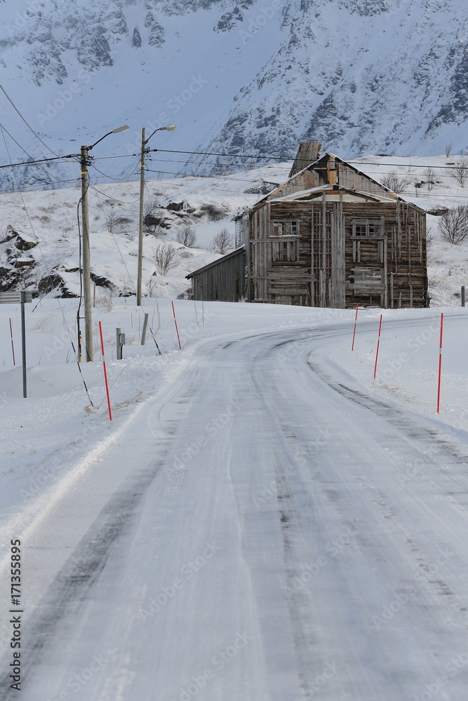 Fototapeta premium Old ruined-abandoned barn-wooden plank hut-Strandveien road to Ytresand. Fredvang-Moskenesoya-Lofoten-Norway. 0414