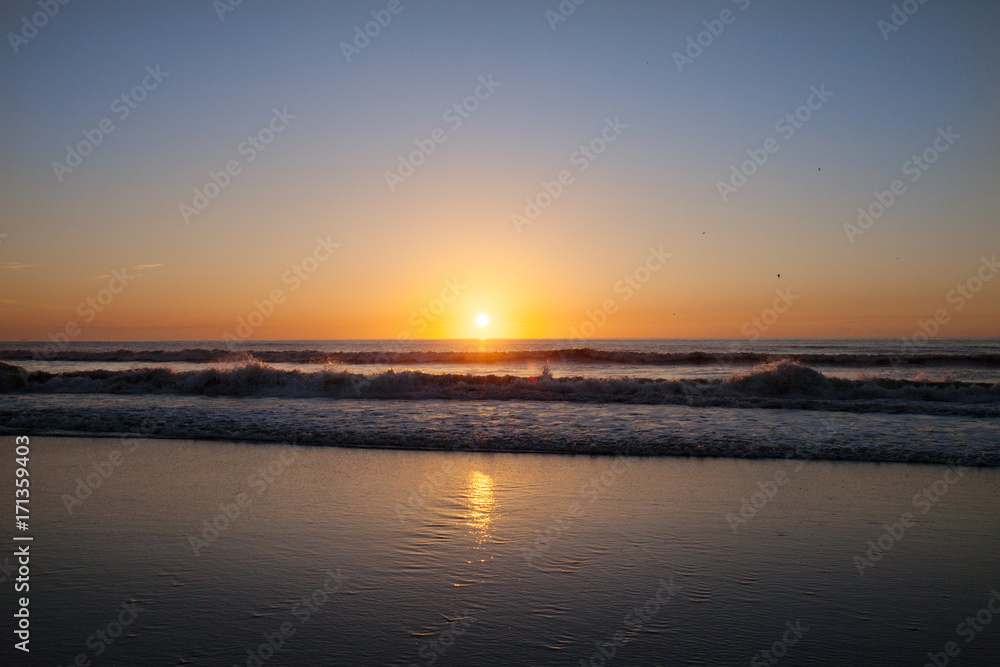 Sunrise over the Waves at the beach