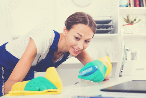 woman cleaner in office