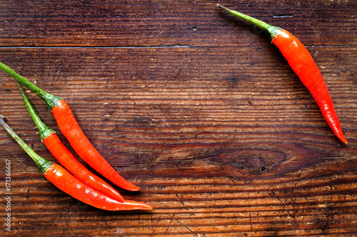 Chili Peppers on wood background