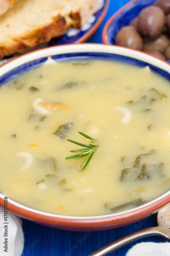 vegetable soup in bowl and olives with corn bread vegetable soup in bowl and olives with corn bread