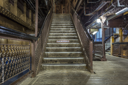 Grungy stairway for a subway platform