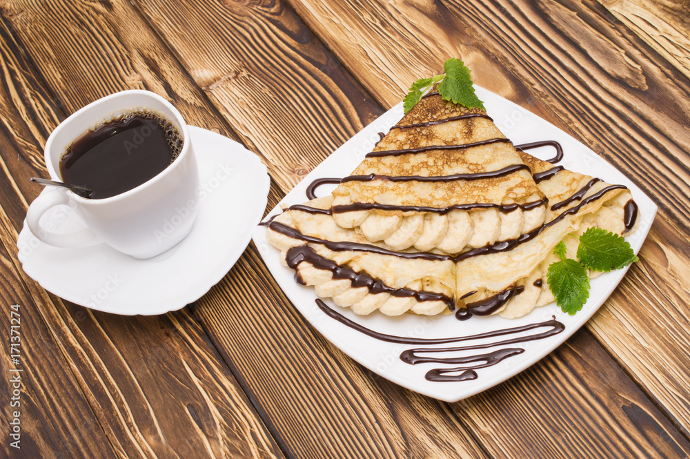 Crepes with Banana, Chocolate with cup of coffee